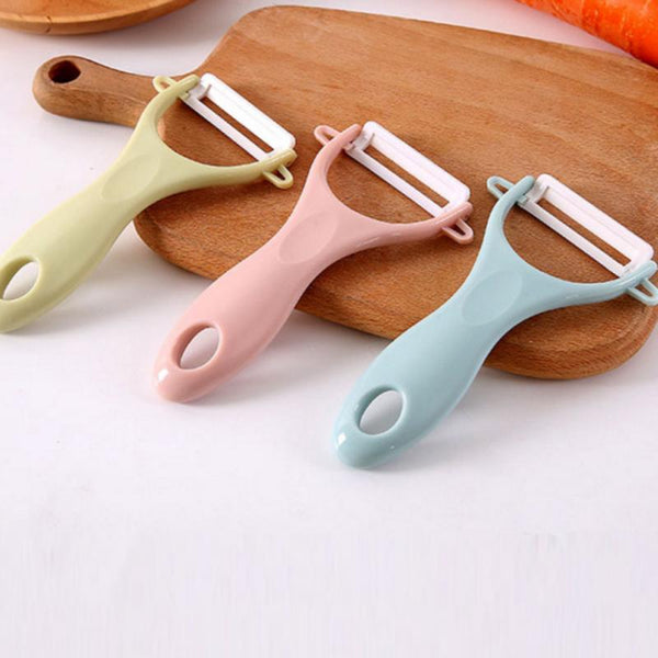 http://thekitchenessence.com/cdn/shop/products/1pc-Ceramic-Vegetable-Fruit-Peeler-Creative-Cutlery-Peeler-Vegetable-Cutter-Cooking-Tools-Kitchen-Accessories-Gadgets_grande.jpg?v=1625569071